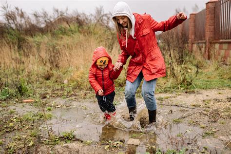 Embrace Your Inner Child: Revel in Playfulness Amidst the Rain