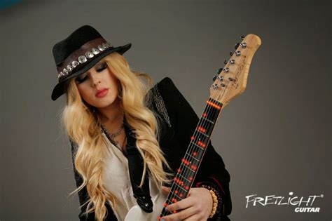 Exploring Orianthi's Childhood and Youth