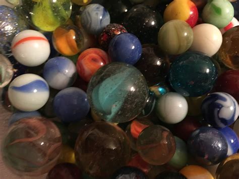 The Enigmatic Realm of Vintage Marbles: Delving into the Tales behind Extraordinary and Antique Pieces