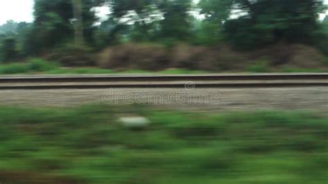 The Marvel of Observing a Train Speeding Along the Railroad